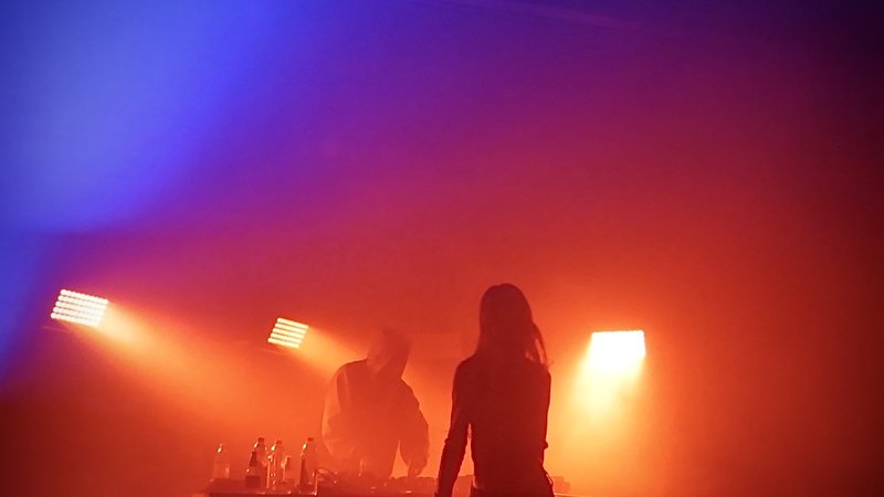 Snow Strippers in orange lighting, Saint Andrew's Hall